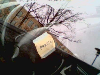 A Post-It note with 'praise' - does someone have anger management issues?