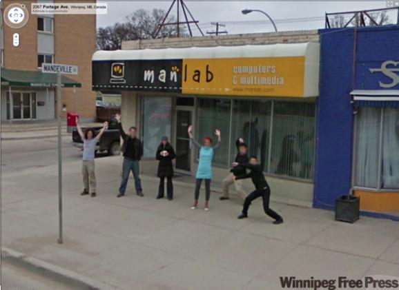 Co-workers from ManLab in Winnipeg, MB ham it up for the Google Street View car.