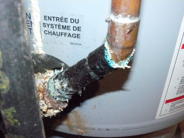 One of the fittings on the old Polaris water heater that was badly corroded and leaking. This one is also immediately above the natural gas inlet.
